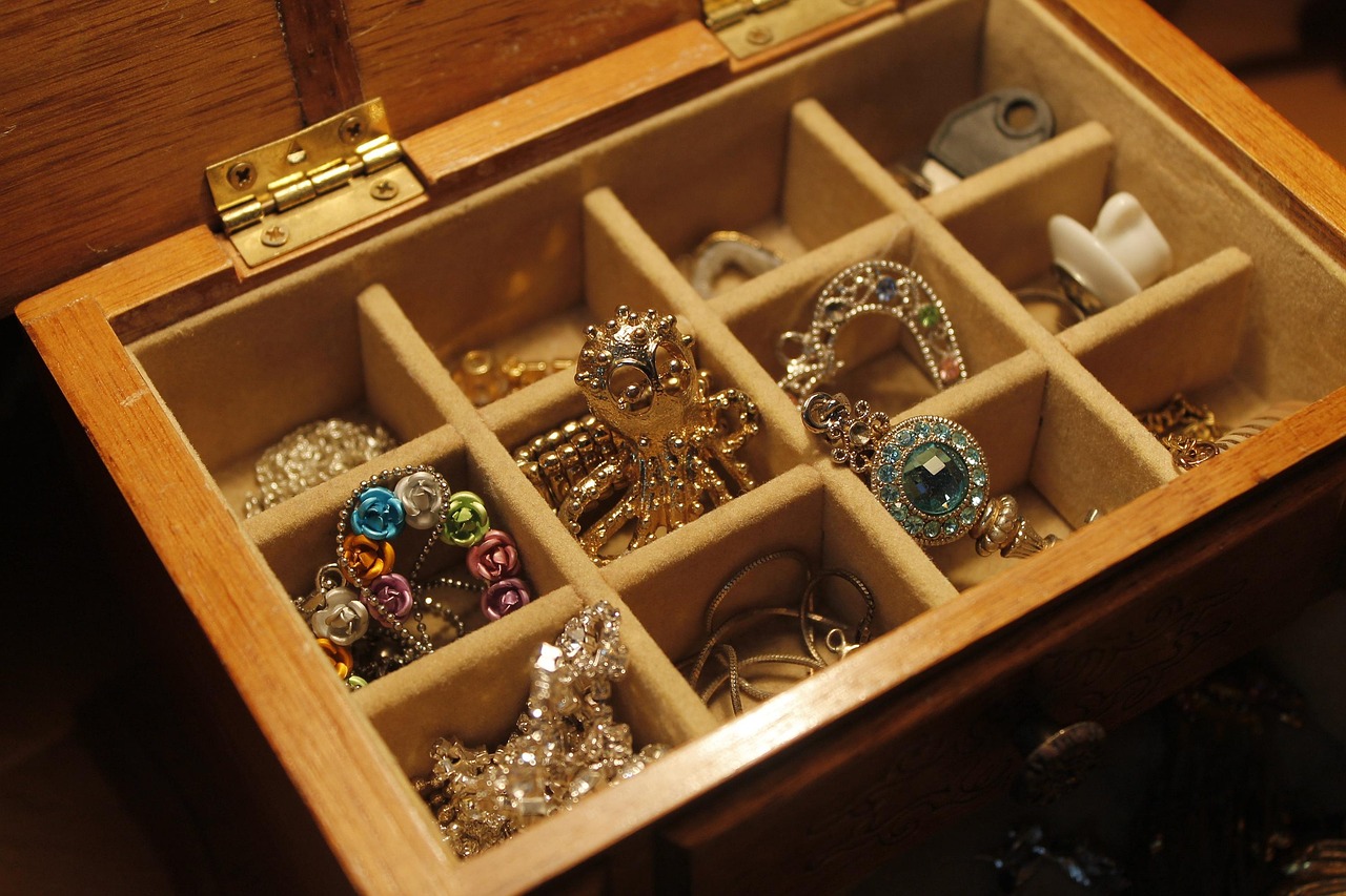 Gold plated jewelry pieces arranged on a surface